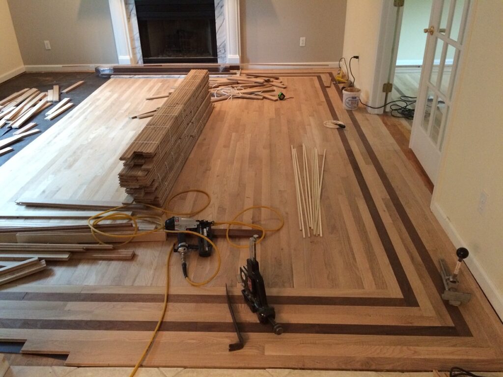 A Wooden Floor Paneling Under Progress